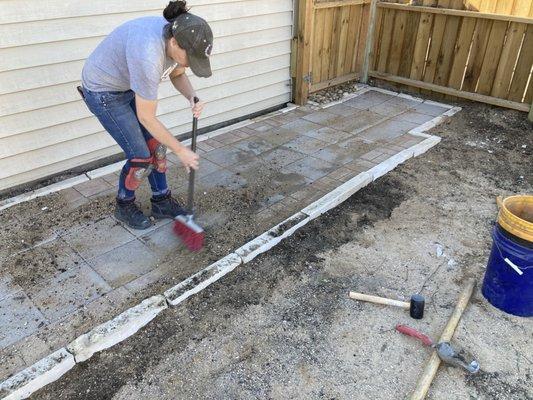 Sealing this paver patio with polymeric sand. This will last for years