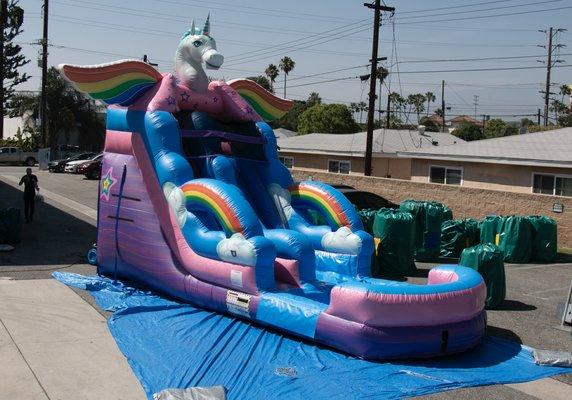 Rent our popular unicorn water slide today!