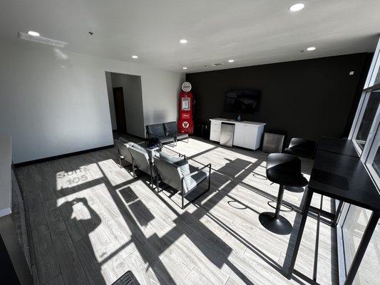 Lobby area. Beverage fridge and cable tv part of their amenities.