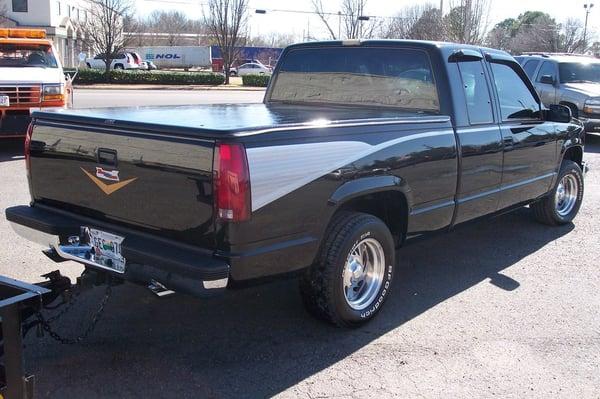 This was a custom job on a 90 Chevy Silverado. It got all over paint, custom stripes down the sides, and new wheels & tires.