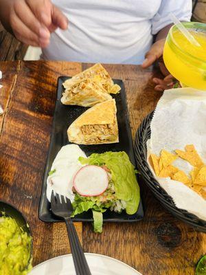 The chicken quesadilla was large enough to share between two people.  Delicious and perfectly seasoned.