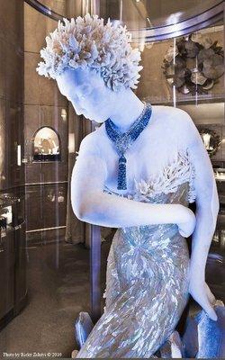 Van Cleef and Arpels holiday window display. Design, fabrication, and onsite installation. Laser cut mother of pearl veneer.