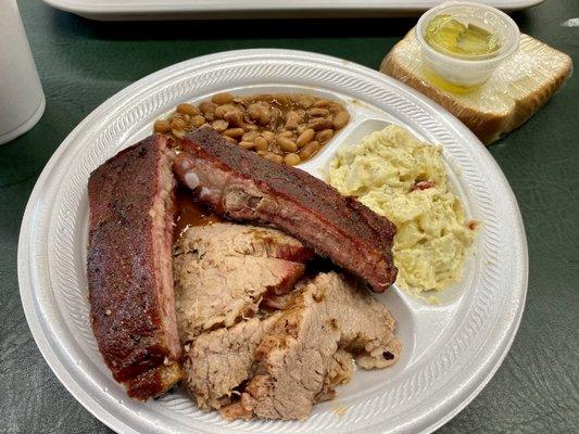 Pork ribs & brisket plate.  -1 pork rib because I just couldn't wait, lol.