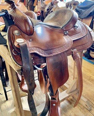 Custom off billets, back Cinch and stirrups all hand tooled and oiled to match this saddle rehab.