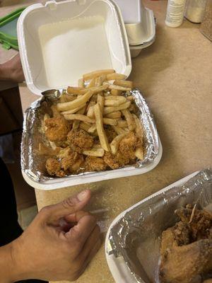 Tiny JUMBO shrimp basket. We paid $19 for this?? Where is the batter/breading like on the pic? Who puts cornmeal on shrimp?