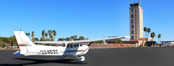 Our new C172R in front of the Tower at TIA