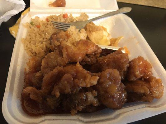 Orange chicken friend rice and crab rangoon