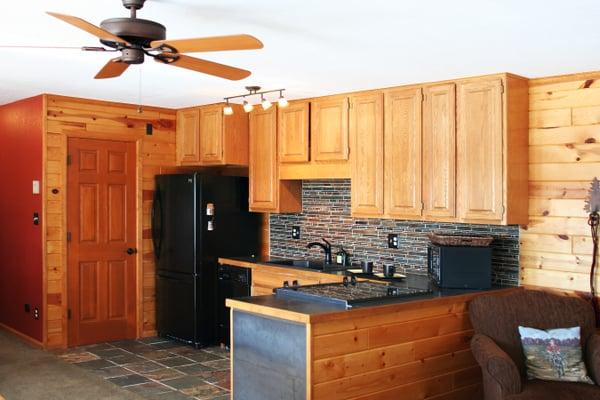 The Guest House's full kitchen, perfect for long-term or corporate stays.