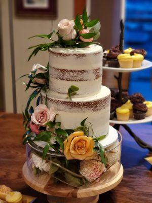 Cake flowers on the cake (faux flowers in the stand)