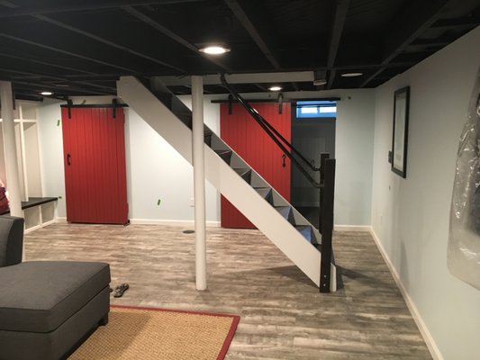 New basement idea - paint the ceiling black! Modern, fresh, clean and a lot less money than putting in a new ceiling!