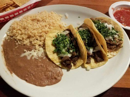 2 Carne asada and 1 carnitas taco.   Yum!