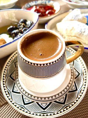 Turkish coffee, freshly brewed.