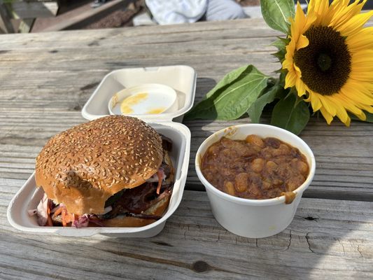 Beef brisket sandwich and beans with pork