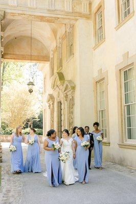 Floor-length bridesmaids dresses in periwinkle and lux chiffon by Bella Bridesmaids. Photo by Leigh Wolfe Photography.