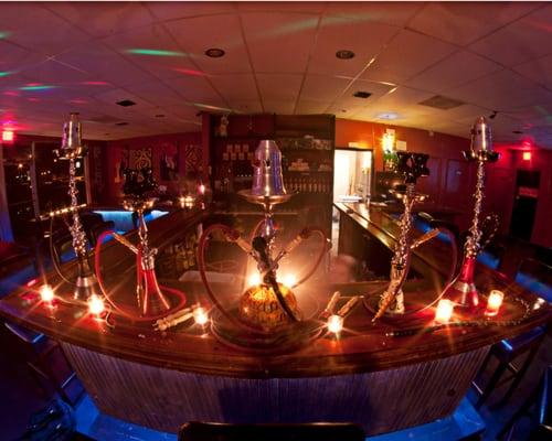 An artful arrangement of hookahs on the bar of Dharma Hookah Lounge!