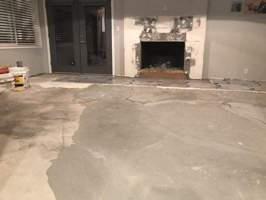 Leveling the floor and demo fireplace