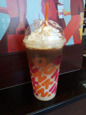 Iced machiatto with caramel and whipcream. Favorite coffee from Dunkin'