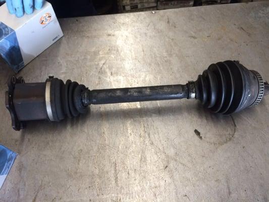 What my CV axle looked like before having the cv joint packed with grease and new boots and clamps.