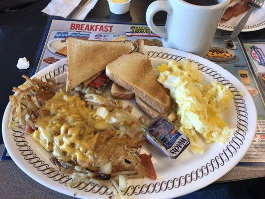 Two eggs breakfast with toast & hash browns