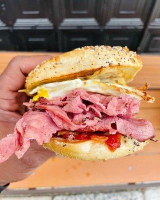 Pastrami on Everything Bagel with Egg