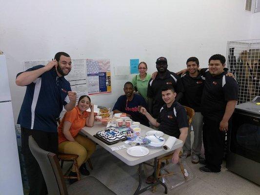 Staff at Majik Rent to Own in Harrisburg, PA enjoying some cake!