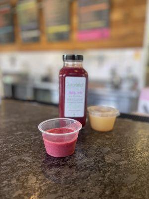 ABCG (bottle). Purple rain smoothie sample and a wake up shot