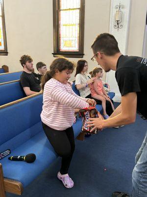 Children receiving treats at our Youth Night