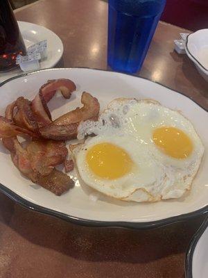 Sunny side up eggs and bacon