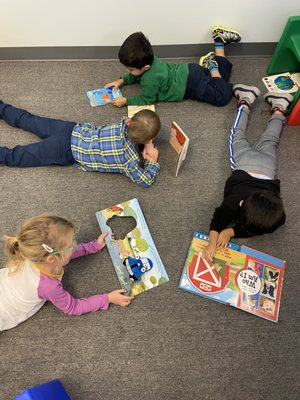 Group reading fun on their stomach for extra sensory input