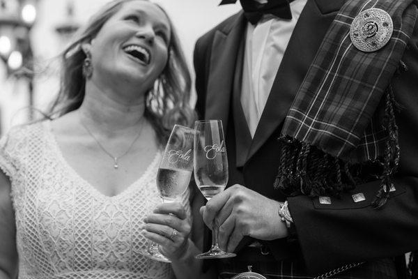 Newlyweds toast at Eola Hills Winery after their intimate ceremony.