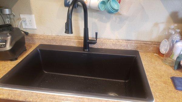 Sink and faucet installed