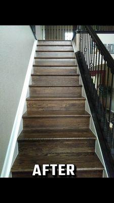 New grey wall paint, white trim, stained floors