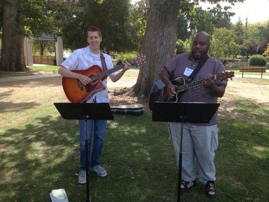 Worship team outside in the park.