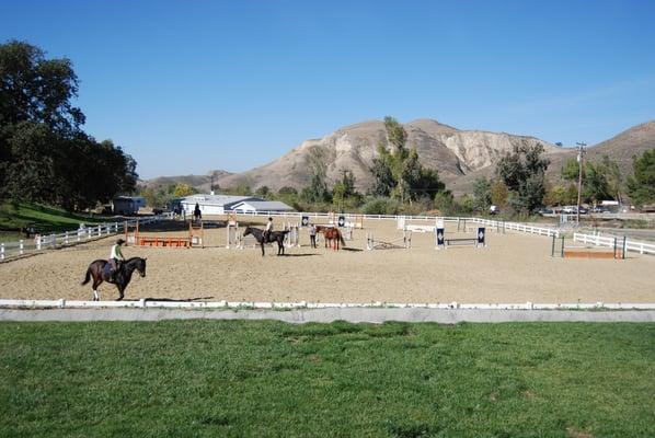 Riders in training with their horses.