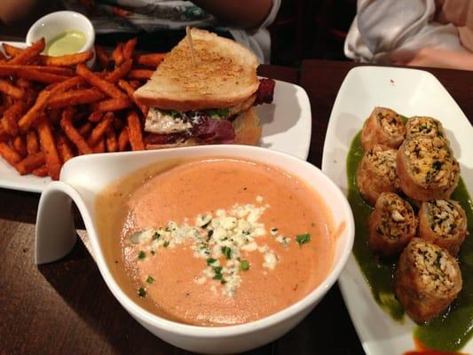 Signature creamy sundried tomato soup, crispy blackened chicken spring rolls, grilled chicken club sandwich