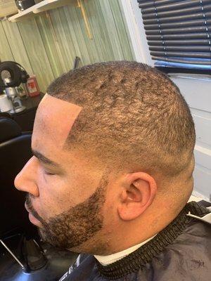 Bald Fade, Beard Trim, Razor Outline & Enhancements.