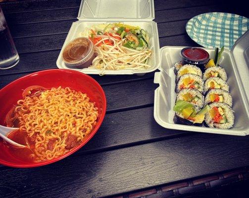 Spicy Pork Ramen, beef kimbap, and cold udon salad with homemade ginger dressing.