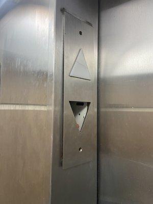 Missing light in the elevator. Something tells me it doesn't get inspected.