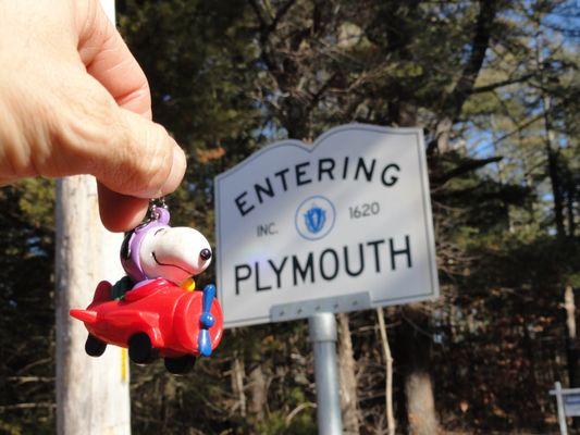 Entering Plymouth with a Snoopy toy.