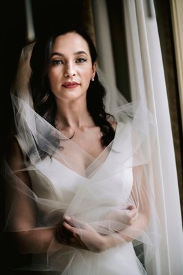 A beautiful bridal portrait sunlit by the window.