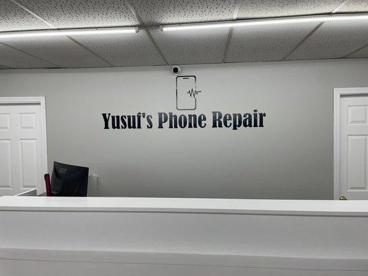 Yusuf's phone repair logo