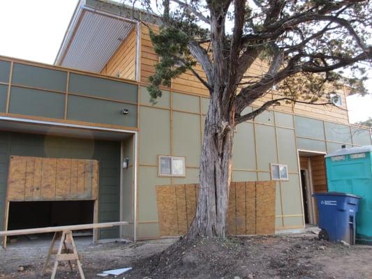 The house was built from the foundation up, to complete framing and siding.