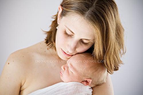 one of my favorite photos that Christie took of me with my newborn.  will always treasure this moment she captured.  ~Emily