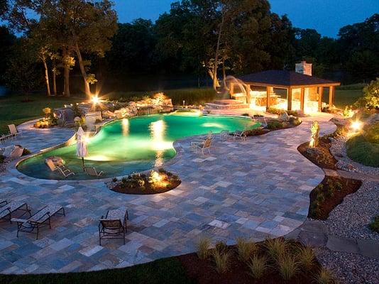 Swimming Pool Install. Natural Stone Coping & Pool Decking, Outdoor living area with masonry fireplace, landscape & lighting.