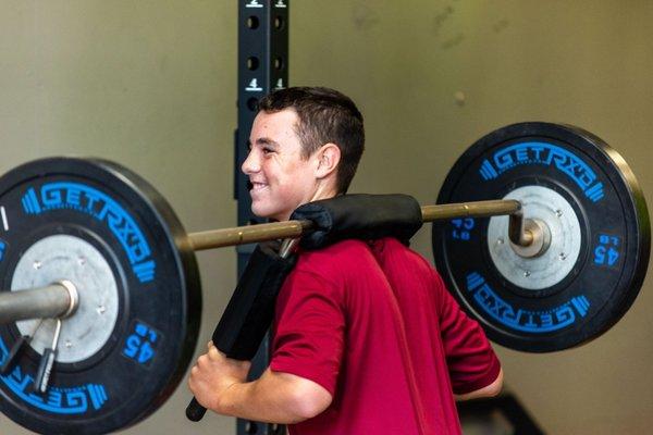 High School Student Athletes smiling while training!