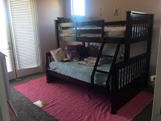 Twin-over-full bunk bed with mattresses and delivery and assembly for $575.