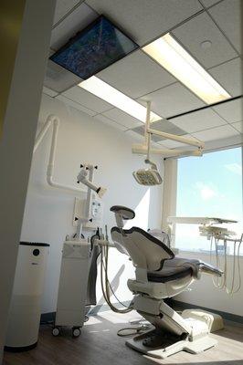 Ceiling-mounted 4K tv's in every operatory to keep you entertained while we work on your smile.