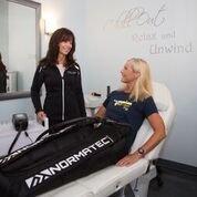 USA Triathlete Coach Karen Tamson getting some much-needed (and deserved) recovery with NormaTec Compression Therapy