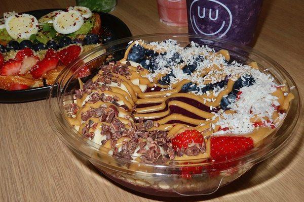 The OG Acai Bowl was made with a pure açái base, blueberry, raspberry, banana, coconut milk, and granola.