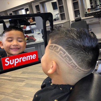 Bald fade with Versace Freestyle Design